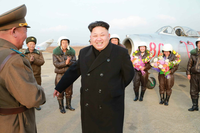 Illustration for article titled Kim Jong Un Visits Female Fighter Pilots, Picks Up Camera For Photo Op
